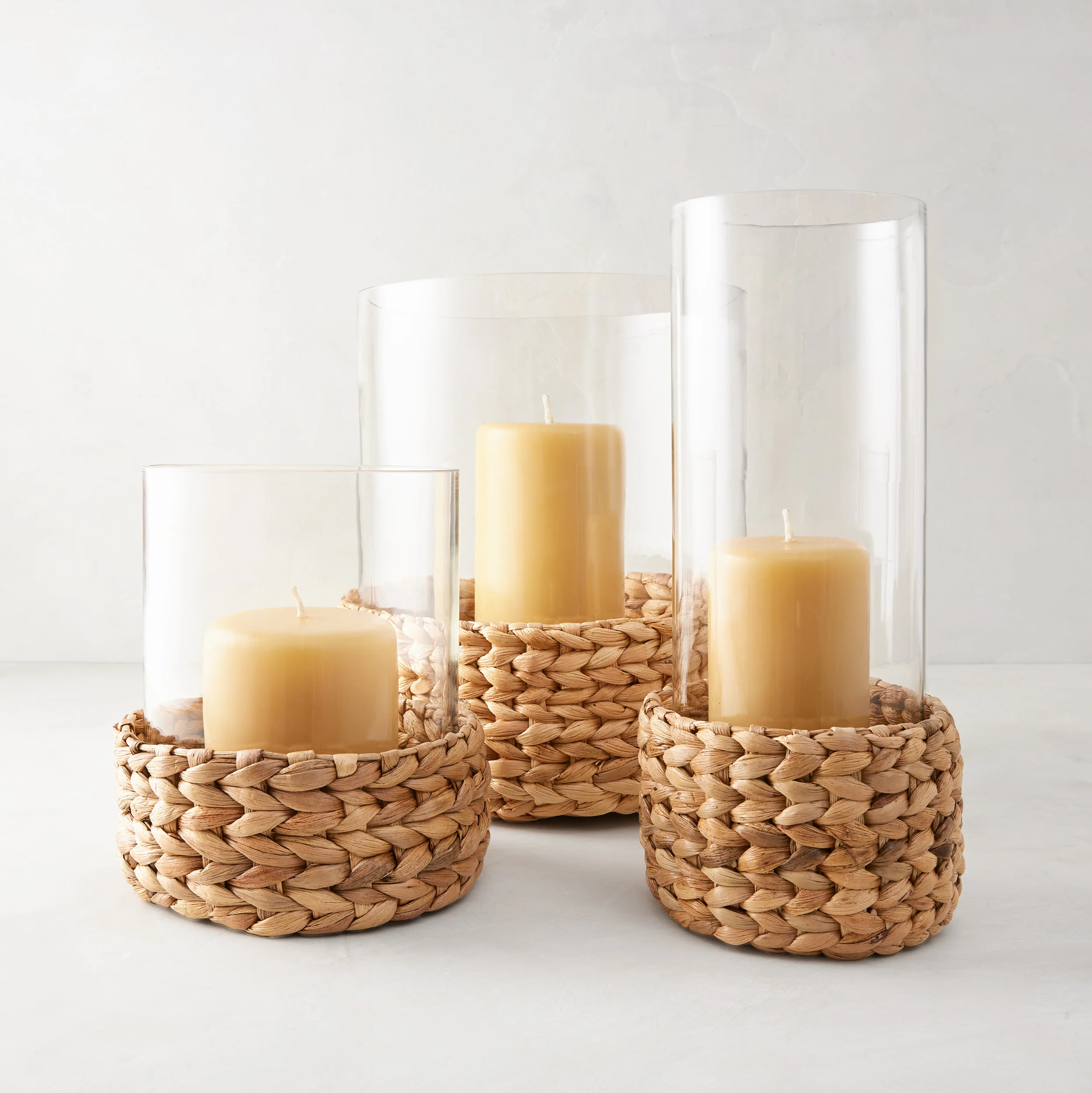 Large Glass Hurricane with Woven Hyacinth Base - Image 2
